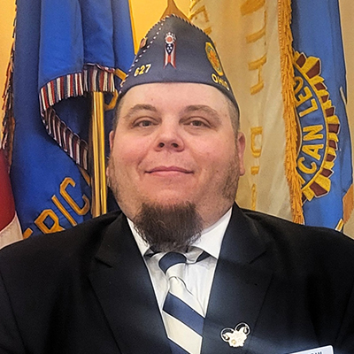 Adam J Budner